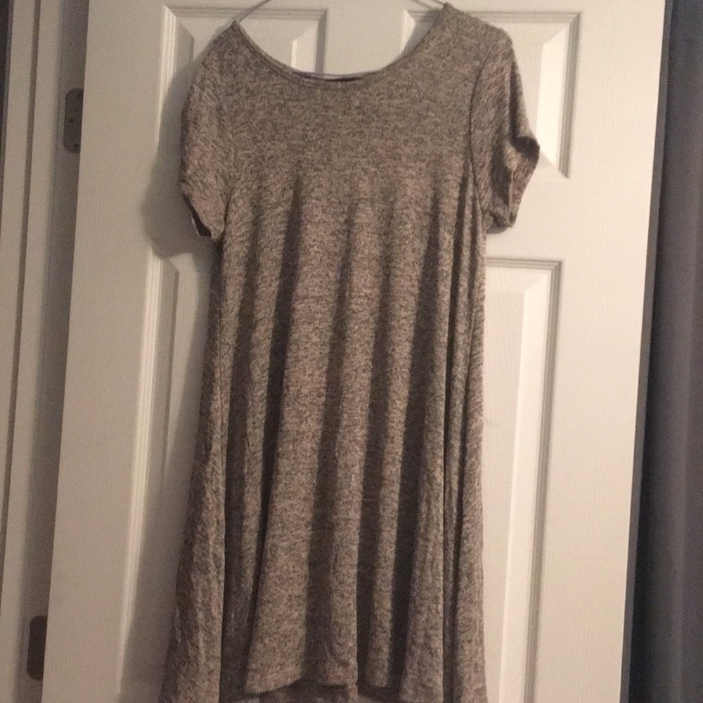 Gray dress that has a mesh look to it